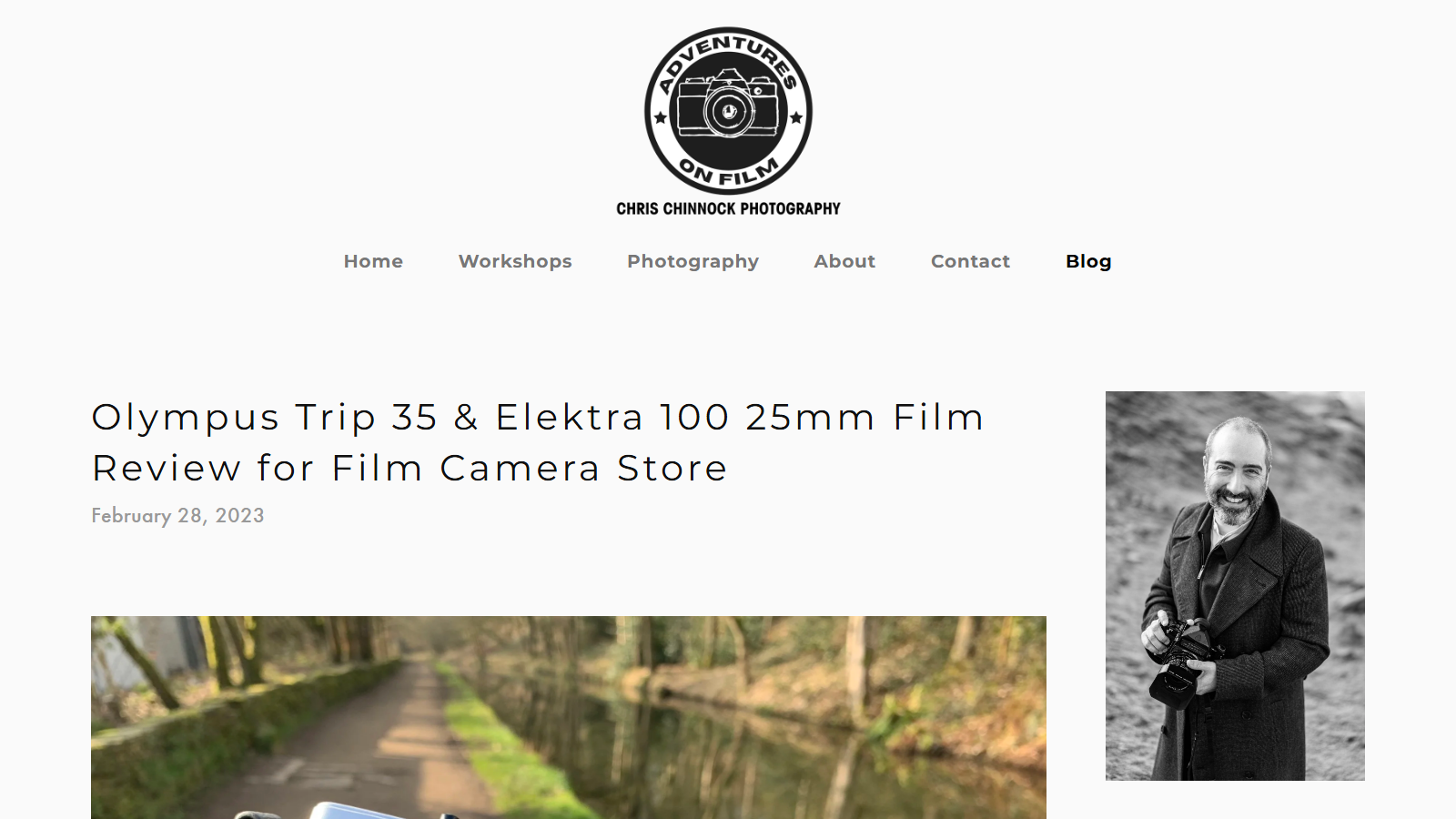 Adventures on Film blog post headed 'Olympus Trip 35 & Elektra 100 25mm Film Review for Film Camera Store', dated February 28 2023, with a colour photo of a canal towpath under bare winter trees and a black-and-white portrait of Chris Chinnock holding a film camera.