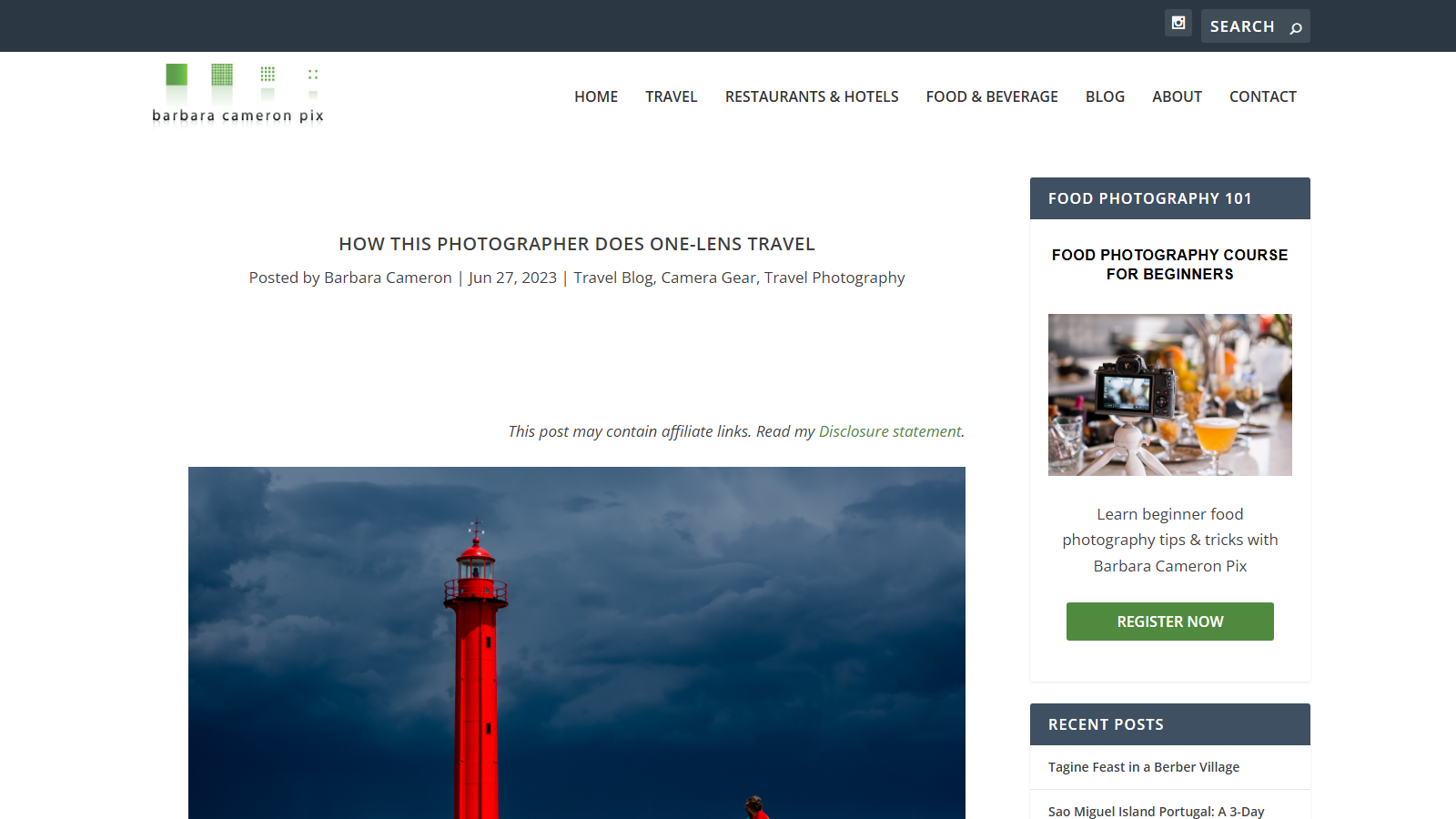 Blog post headed How This Photographer Does One-Lens Travel, bylined Barbara Cameron and dated 27 June 2023, above her photograph of a bright red lighthouse against heavy dark storm clouds.